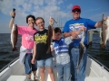 family fishing on navarre charter boat